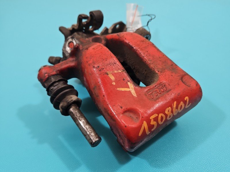 Zacisk tył lewy Opel Zafira B 1.9 cdti HB