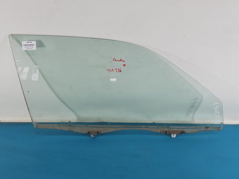 Szyba drzwi przód prawa Toyota Corolla E11 HB