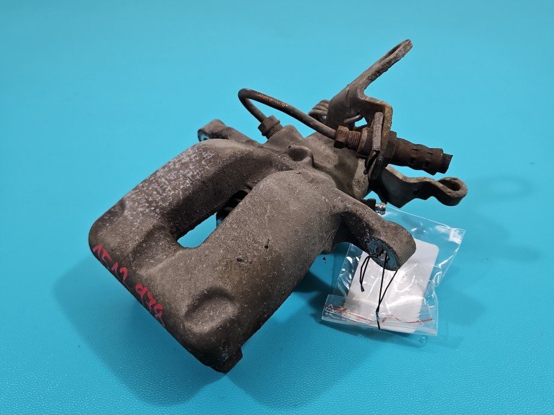 Zacisk tył lewy Skoda Octavia II 2.0 tdi kombi