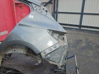 Błotnik tył lewy Opel Astra V K ćwiartka grafitowy z10a