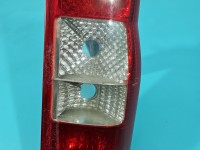 Lampa tył lewa Producent części: FORD, BEZ WKŁADU TYC, RYSY NA KLOSZU Ford Transit MK7 06-13 HB
