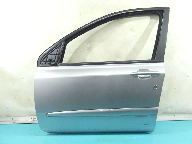 Drzwi przód lewe Fiat Stilo 5d srebrny