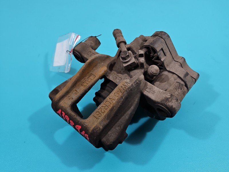 Zacisk tył lewy Vw Caddy IV 2.0 tdi HB