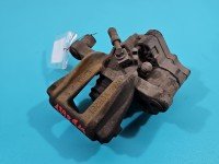 Zacisk tył lewy Vw Caddy IV 2.0 tdi HB