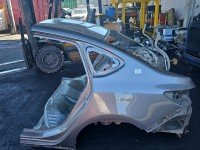 Błotnik tył lewy Opel Astra IV J ćwiartka beżowy Z41W