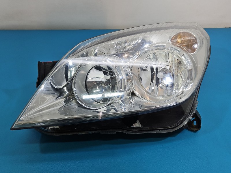 Reflektor lewy lampa przód Opel Astra III H EUROPA 1EG270370-61