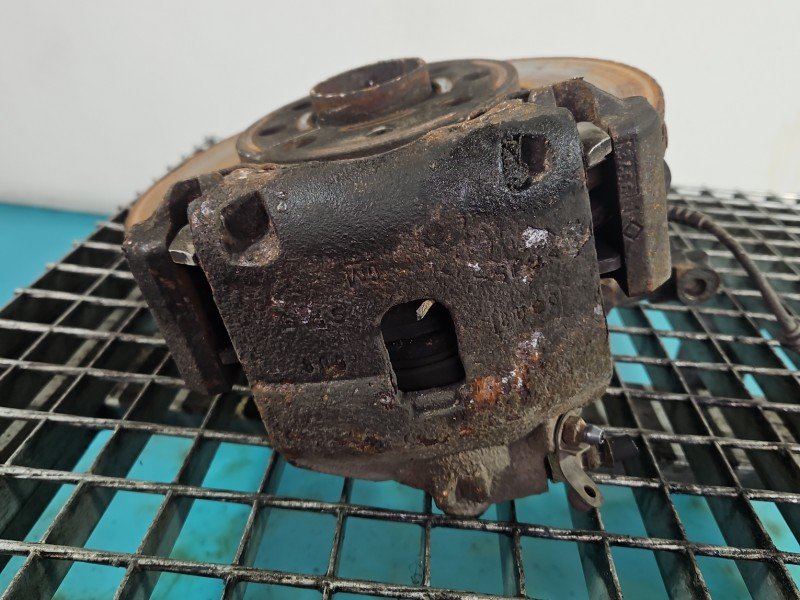 Zacisk przód prawy Opel Corsa E 1.4 16V