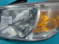 Reflektor lewy lampa przód Dodge Caravan V 07-20 EUROPA