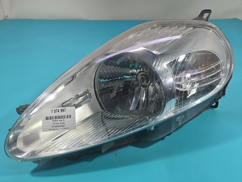 Reflektor lewy lampa przód Fiat Grande Punto EUROPA