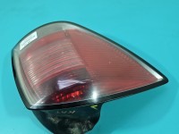 Lampa tył lewa Producent części: OPEL, mikropęknięcia Z LISTWĄ ŻARÓWKOWĄ KOMBI Opel Astra III H kombi