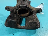 Zacisk przód lewy Vw Golf III 1.8 jedn