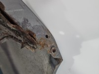 Błotnik przód lewy Fiat Grande Punto srebrny 595/A