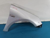 Błotnik przód prawy Opel Astra V K srebrny Z176