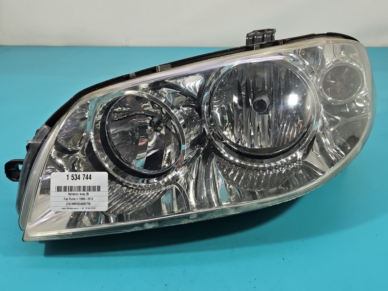 Reflektor lewy lampa przód Fiat Punto II EUROPA