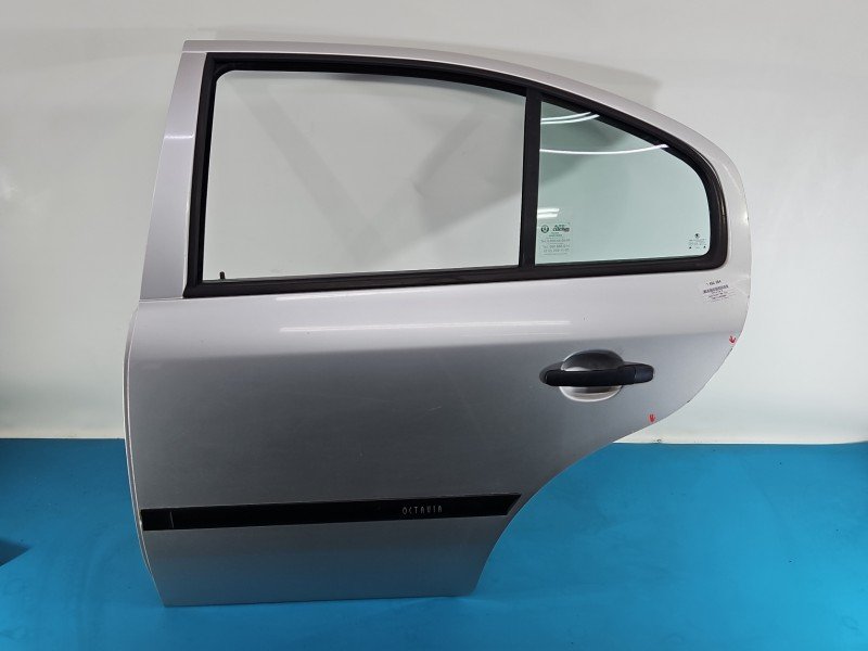 Drzwi tył lewe Skoda Octavia I HB 5d srebrny 9102