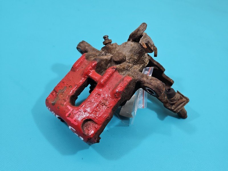 Zacisk tył lewy Honda Civic VIII UFO 2.1 i-CTDi N22A2 HB