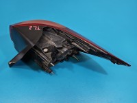 Lampa tył lewa Opel Astra V K kombi EUROPA 39077374