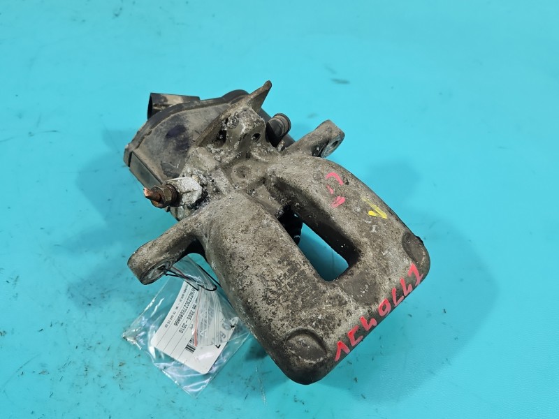 Zacisk tył lewy Vw Passat B6 1.9 tdi kombi