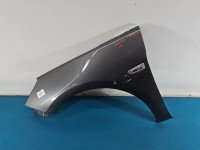 Błotnik przód lewy Opel Astra V K grafitowy z10a