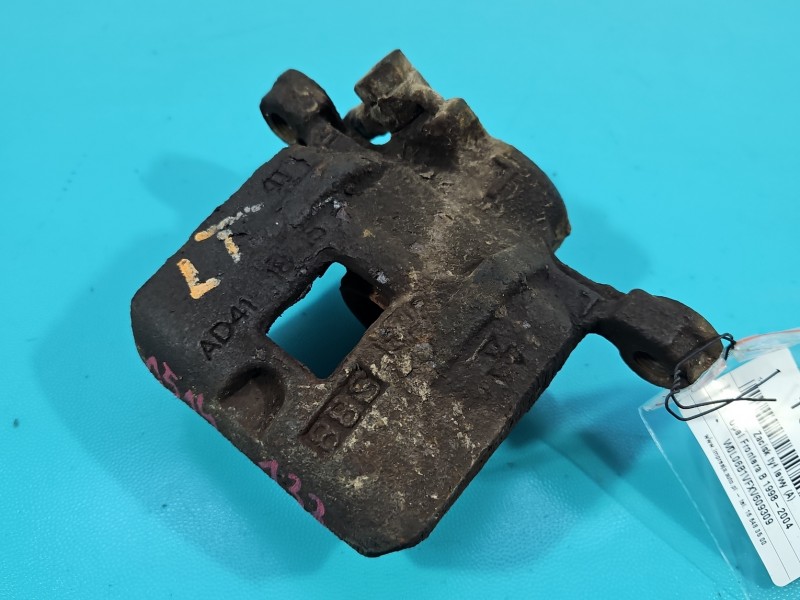Zacisk tył lewy Opel Frontera B 2.2 16V HB