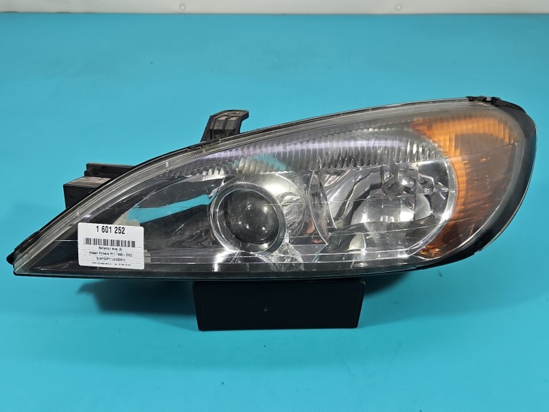 Reflektor lewy lampa przód Nissan Primera P11 EUROPA 89003046, 260609F610