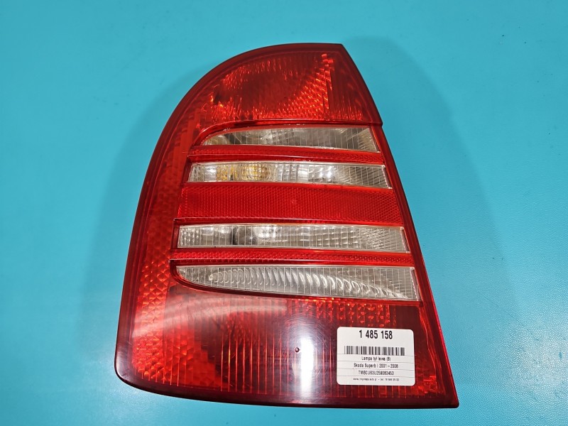 Lampa tył lewa Lekko wypalone gniazdo żarówki. Skoda Superb I sedan