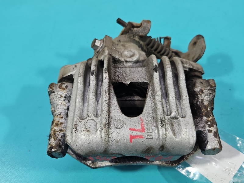 Zacisk tył lewy Opel Astra II G HB 1.6 8V