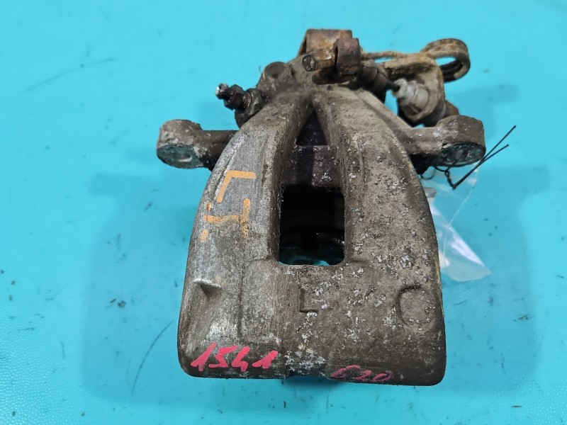 Zacisk tył lewy Peugeot 207 1.6 hdi inny