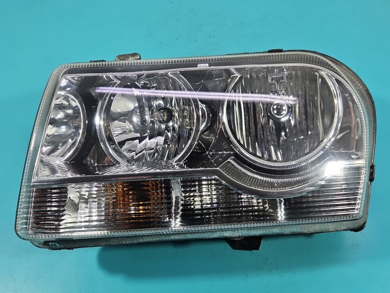 Reflektor lewy lampa przód Chrysler 300c EUROPA CS174-B001L