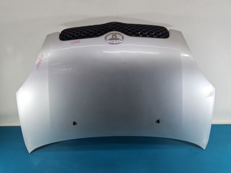 Maska przednia Toyota Yaris I srebrny 1E7