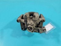 Zacisk tył lewy Opel Astra V K 1.6 cdti kombi