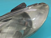 Reflektor lewy lampa przód Peugeot 206 EUROPA 9640559580