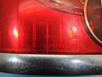 Lampa tył lewa Toyota Avensis II T25 kombi TOYOTA, KOITO 03-06 Urwane mocowanie przy wkładzie lampy EUROPA