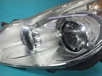Reflektor lewy lampa przód Opel Corsa D EUROPA