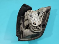 Lampa tył lewa Producent części: OPEL, mikropęknięcia Z LISTWĄ ŻARÓWKOWĄ KOMBI Opel Astra III H kombi