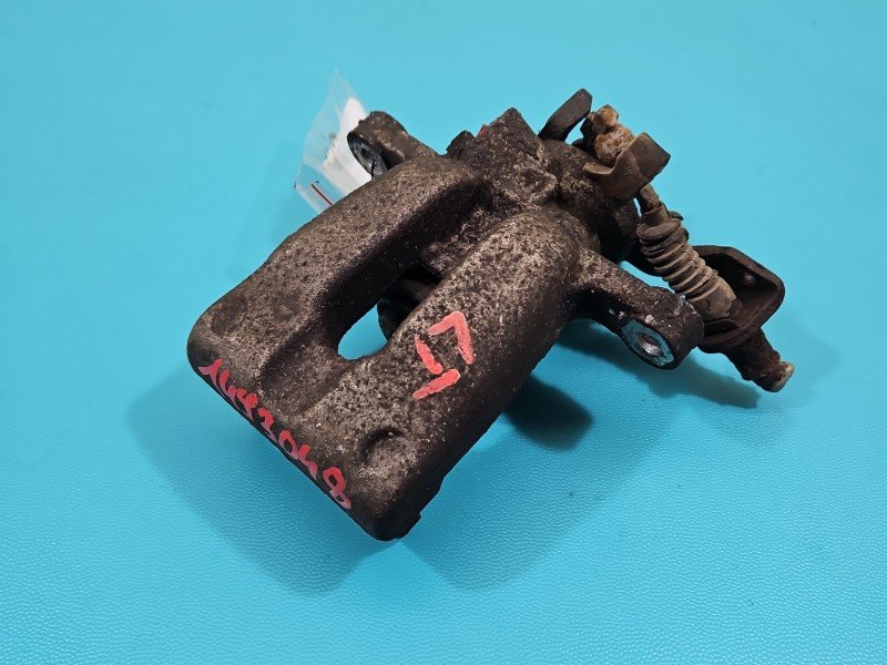 Zacisk tył lewy Opel Meriva A 1.7 cdti HB