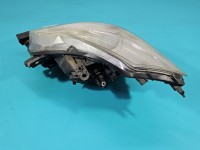 Reflektor prawy lampa przód Renault Clio III EUROPA 7701061069, 89900134
