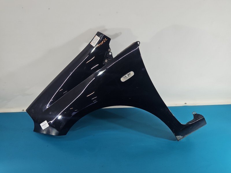 Błotnik przód lewy Fiat Grande Punto granatowy 475