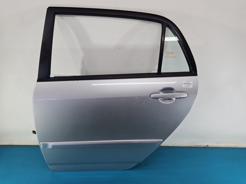 Drzwi tył lewe Toyota Corolla E12 HB 5d srebrny 199