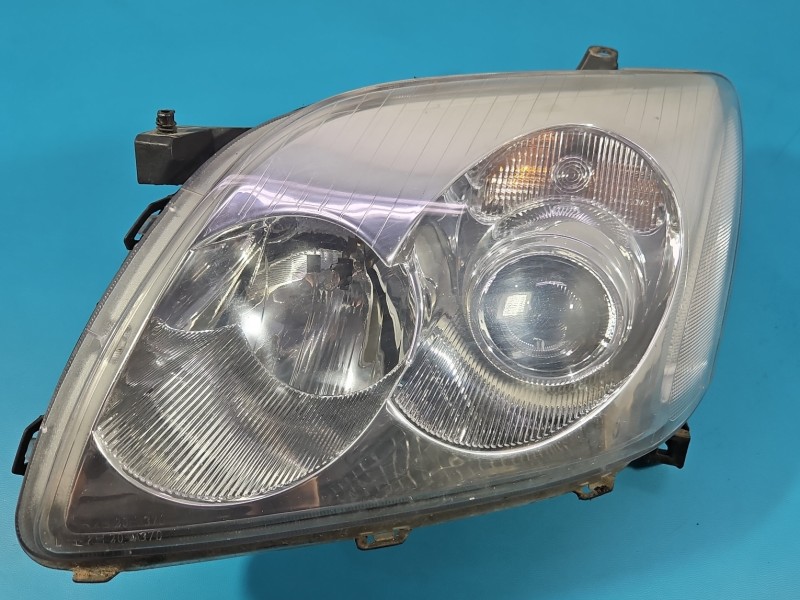 Reflektor lewy lampa przód Toyota Avensis II T25 EUROPA