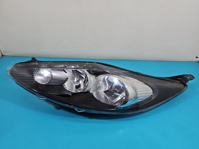 Reflektor lewy lampa przód Ford Fiesta Mk7 EUROPA Reflektor lewy lampa przód Ford Fiesta Mk7 EUROPA