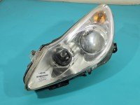 Reflektor lewy lampa przód Opel Corsa D EUROPA