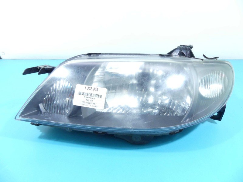 Reflektor lewy lampa przód Mazda 323f EUROPA