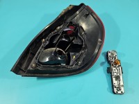 Lampa tył lewa Nissan Almera N16 HB lekko nadpalony otwór na żarówkę porysowana Z LISTWĄ ŻARÓWKOWĄ 00-03 PRZED LIFTEM...