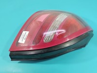 Lampa tył lewa Nissan Almera N16 HB 00-03 przed liftem hatchback Z LISTWĄ ŻARÓWKOWĄ EUROPA