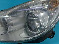 Reflektor lewy lampa przód Opel Corsa D EUROPA