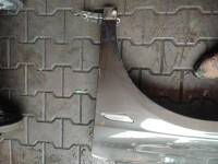 Błotnik przód lewy Lancia Delta III 08-14 grafitowy 284