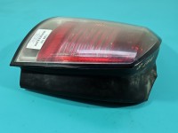 Lampa tył lewa Producent części: OPEL, mikropęknięcia Z LISTWĄ ŻARÓWKOWĄ KOMBI Opel Astra III H kombi